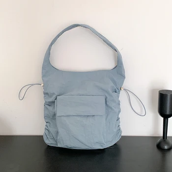 2023 Naujas vasaros nailoninis moteriškas krepšys su raišteliu Mažas krepšys per petį Japonijos stilius Plicated Youth Light Rankinės Visas išpardavimas