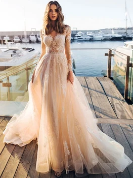 Mieloji nuotakos suknelė 2023 Ilgos nėrinių rankovės Aplikacijos vestuvinės suknelės Romantiškas nugaros mygtukas Skaičius Tiulio traukinys Vestido De Novia