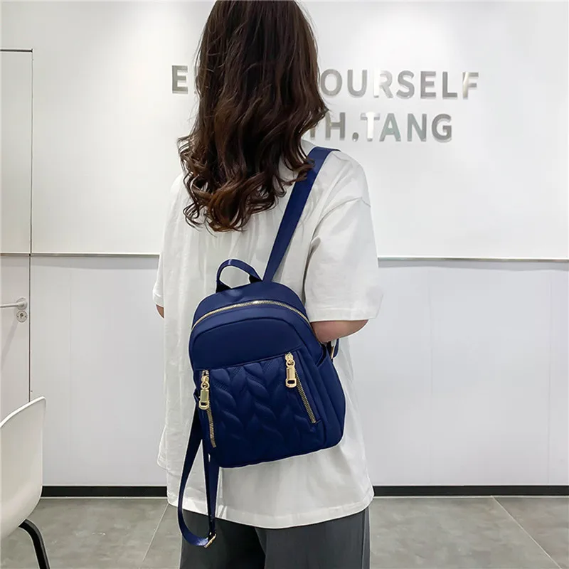 Naujos mados moteriška kuprinė Urban Simple Casual Backpack Trend Travel Solid Color Nylon Bag Waterproof Lightweight Ladies Bag Nuotrauka 0