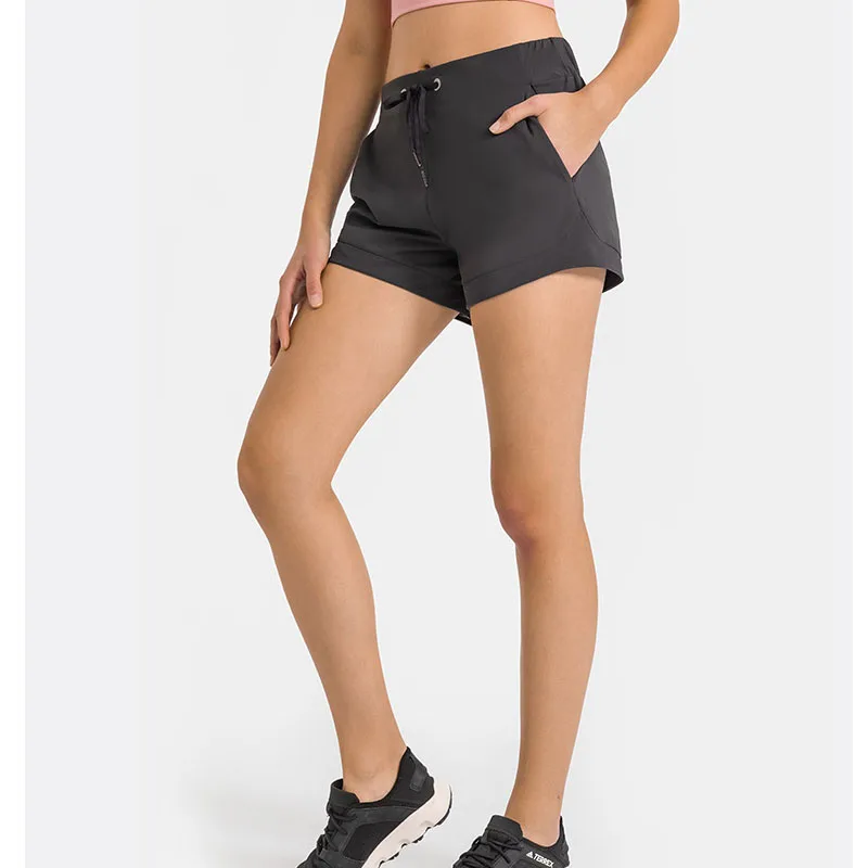 Essential Nylon Running Workout Sport Shorts Women Relaxed Fit Locker Fitness Gym šortai su šonine kišene Nuotrauka 3